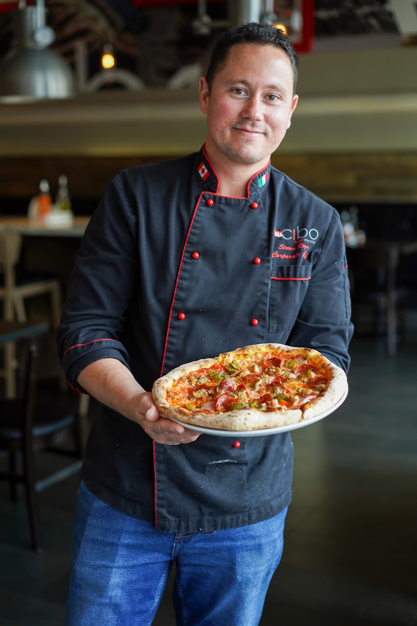 Via Cibo chef with pizza